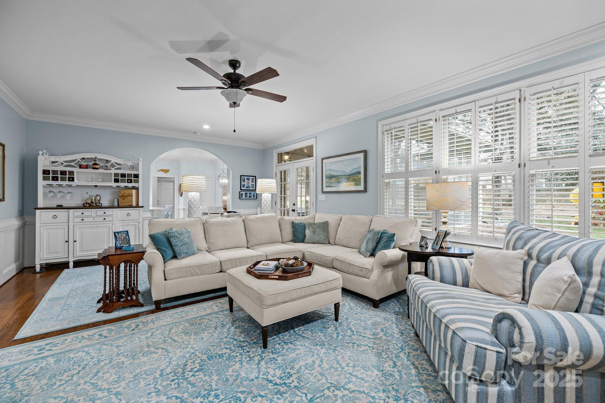 4739 Binfords Ridge Road Charlotte, NC 28226 - Photo 9 of 47 a living room with furniture and a large window