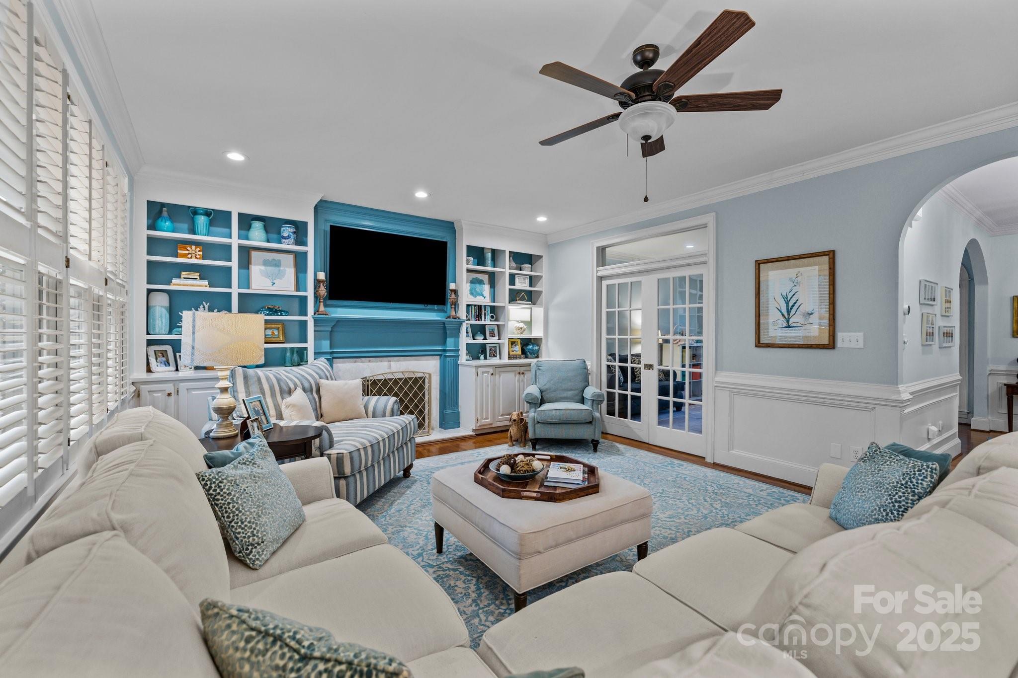 4739 Binfords Ridge Road Charlotte, NC 28226 - Photo 10 of 47 a living room with furniture and a flat screen tv