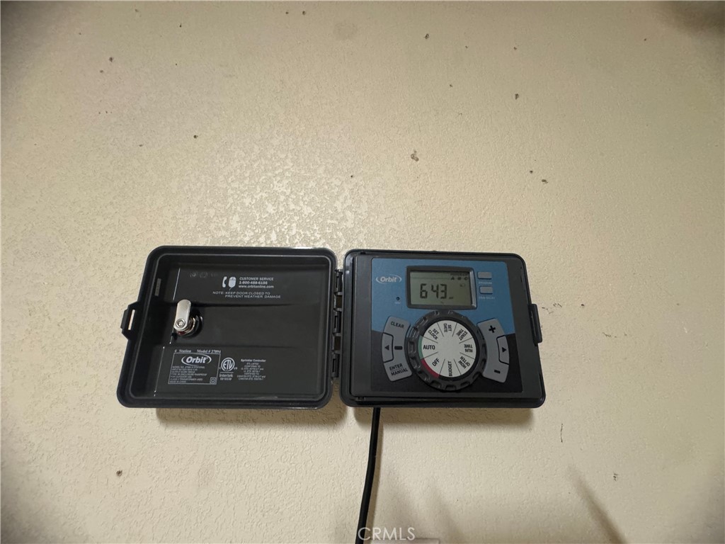 1339 Playa Del Rey Drive Merced, CA 95348 - Photo 46 of 48 a wooden floor with a clock on it