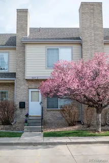 a front view of a house with garage