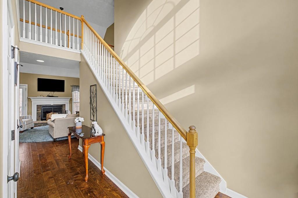 218 Amaranth Court Ball Ground, GA 30107 - Photo 22 of 39 a view of entryway and hall with wooden floor
