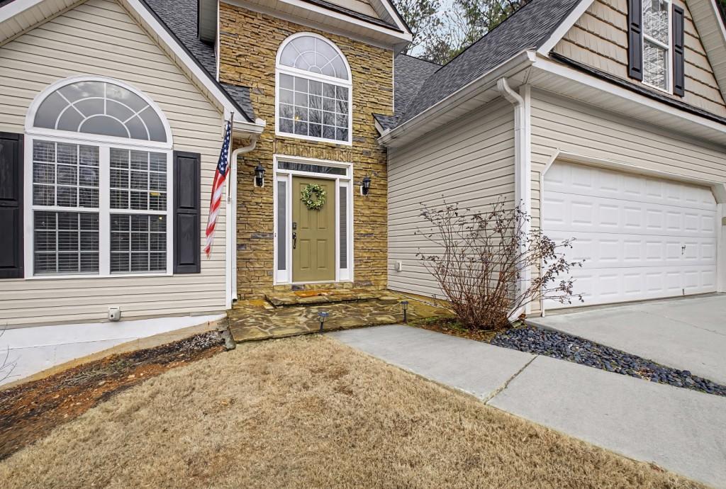 218 Amaranth Court Ball Ground, GA 30107 - Photo 3 of 39 a view of a house with a yard