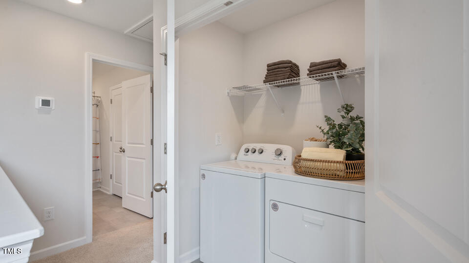 419 Belgian Red Way Wake Forest, NC 27587 - Photo 23 of 30 a utility room with dryer and washer