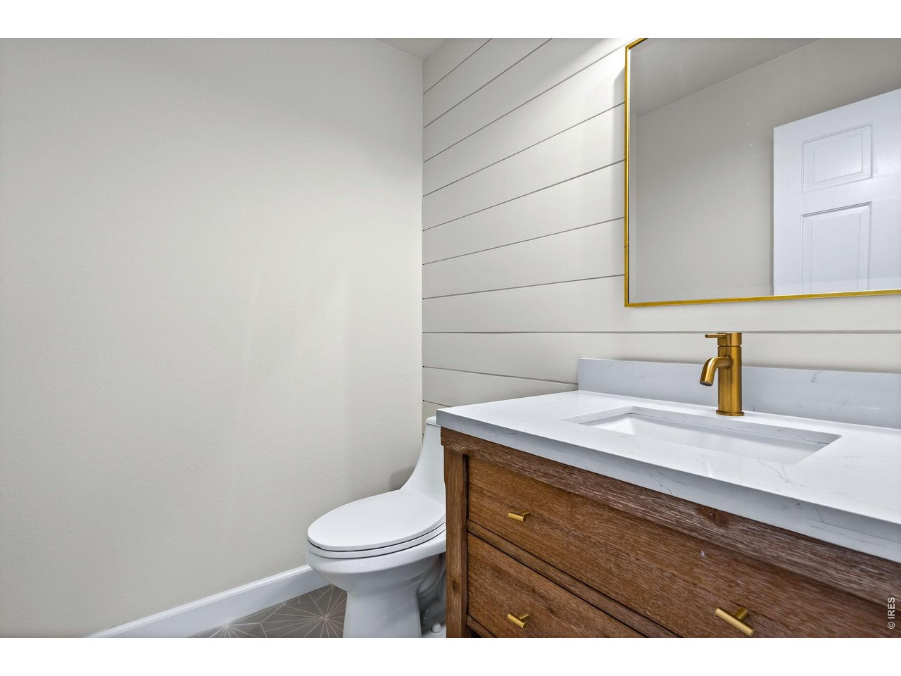 4133 Sumter Square Fort Collins, CO 80525 - Photo 18 of 42 a bathroom with a sink and a toilet
