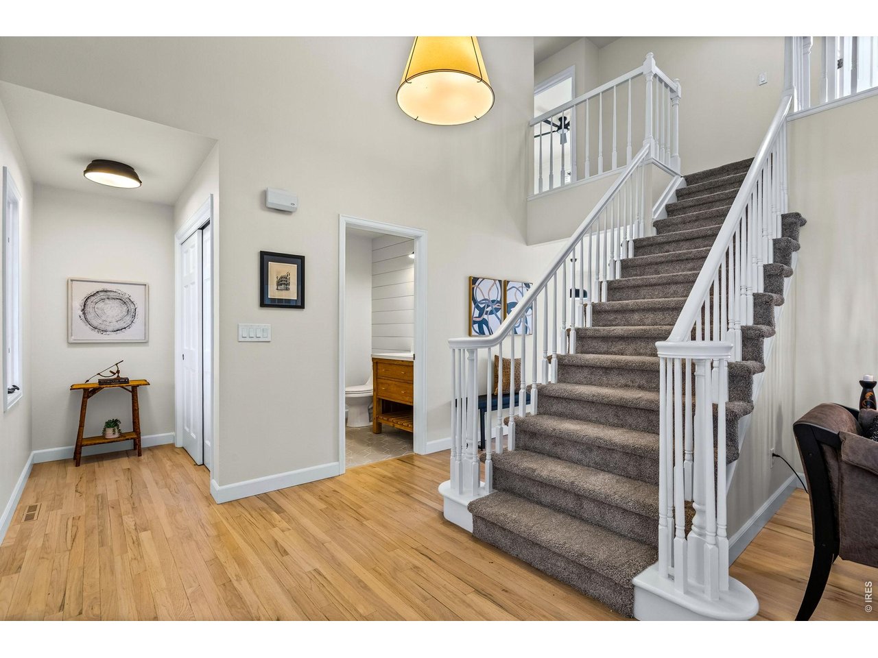 4133 Sumter Square Fort Collins, CO 80525 - Photo 19 of 42 a view of an entryway with wooden floor