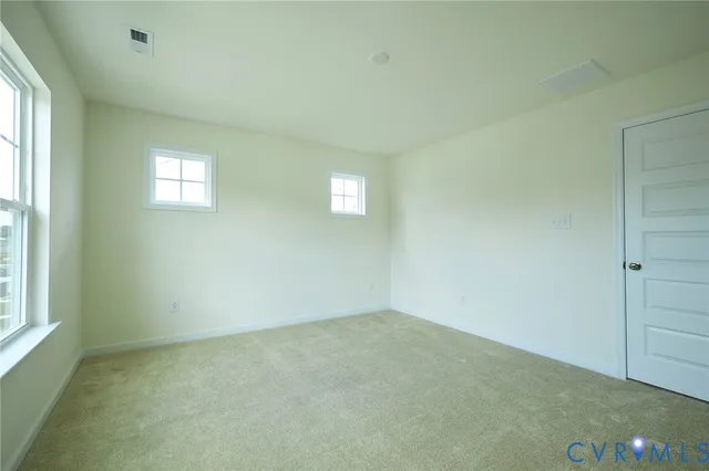 a bathroom with a sink toilet and a mirror