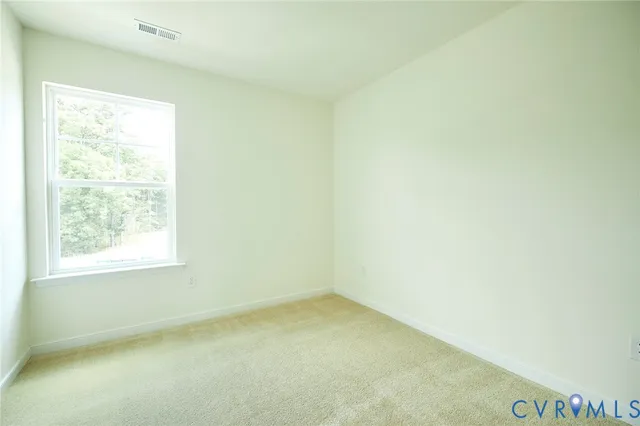 an empty room with cabinet