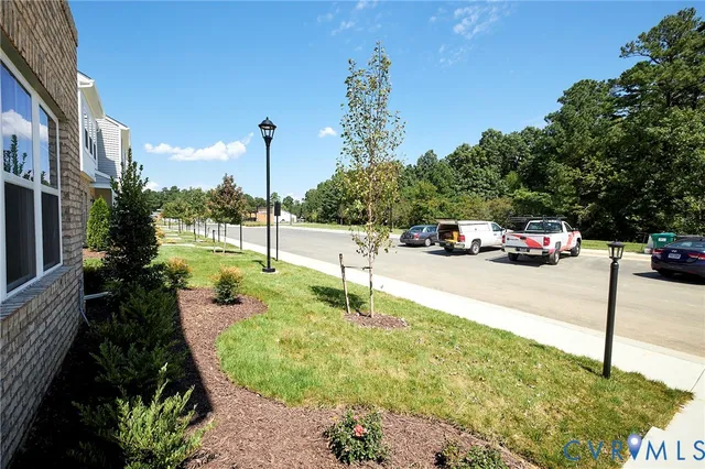 a view of a street with cars