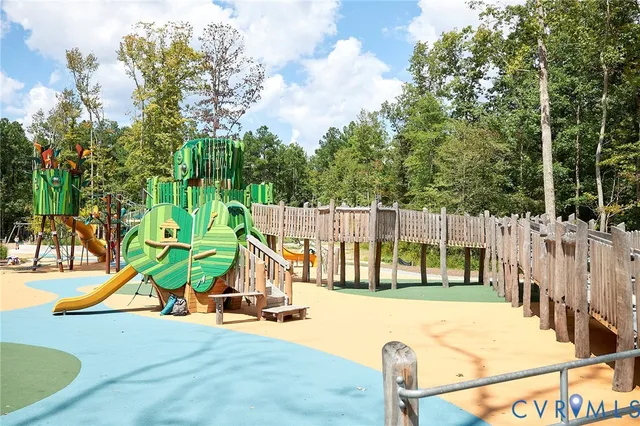 a view of swimming pool with seating space