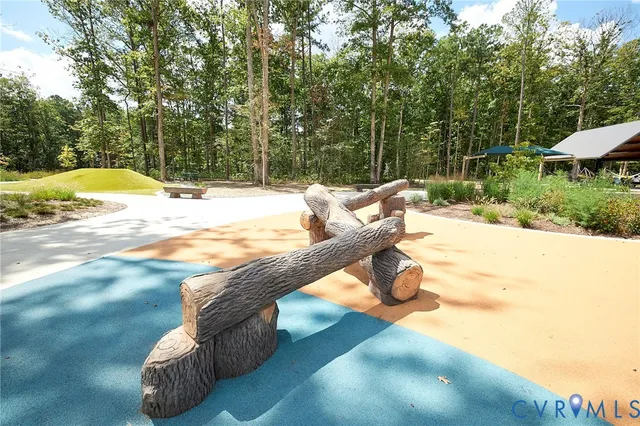 a view of balcony with table and chairs
