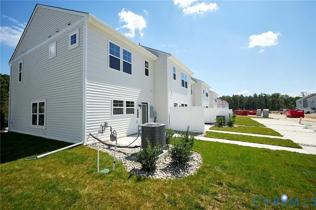 a house view with a backyard space