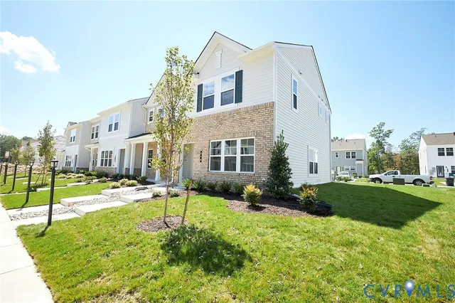 a house view with a garden space