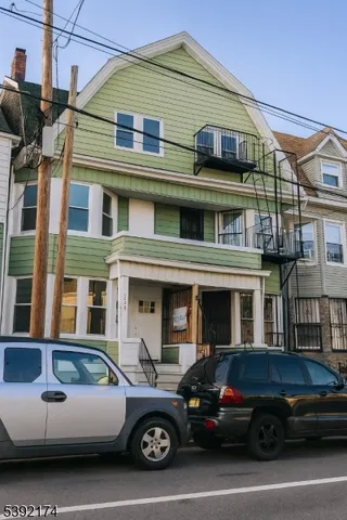 a car parked in front of a house