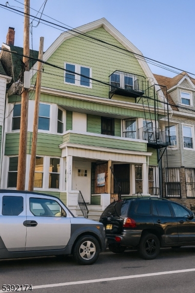 a car parked in front of a house