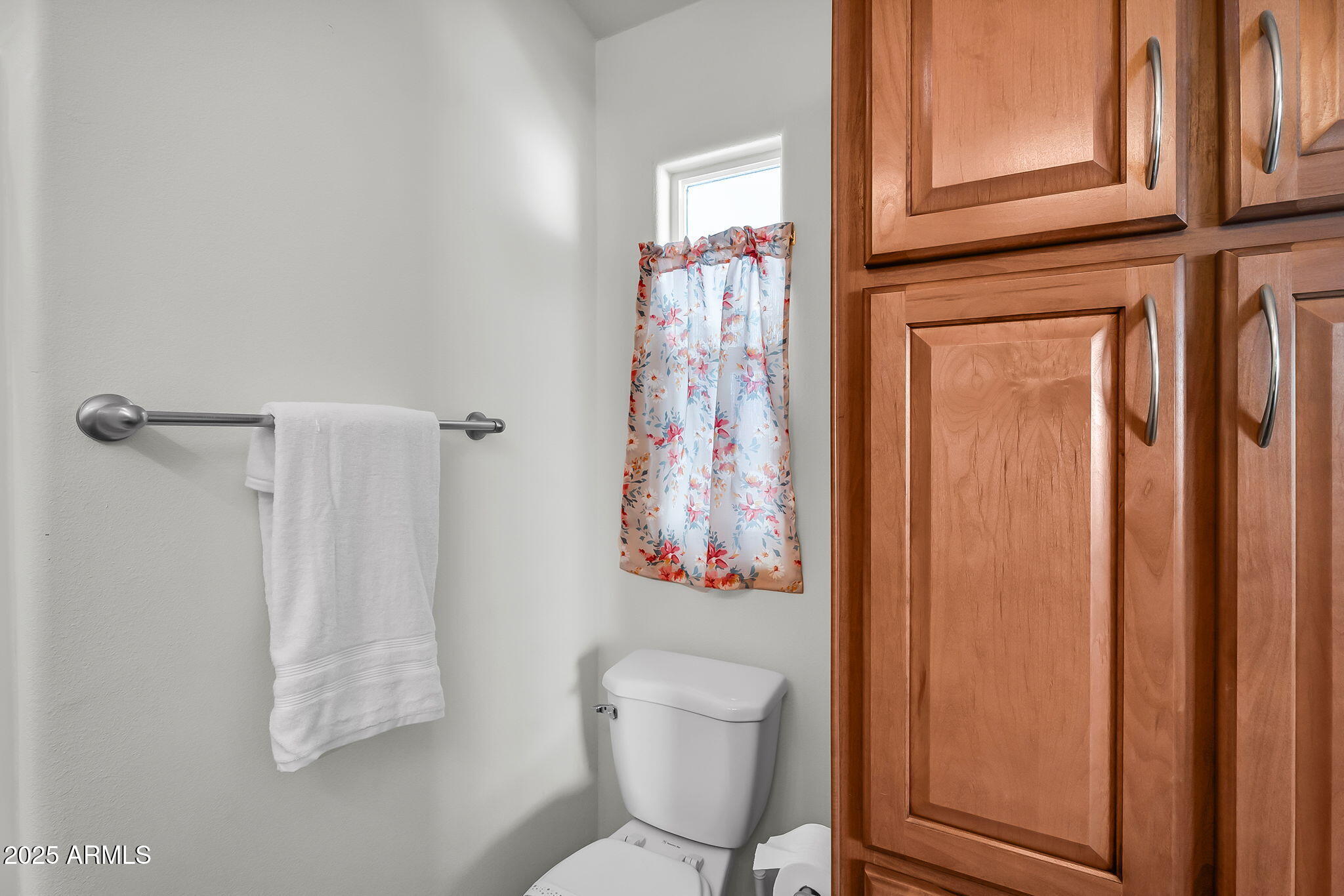 8865 East Baseline Road, Unit 802 Mesa, AZ 85209 - Photo 17 of 44 a bathroom with a shower curtain