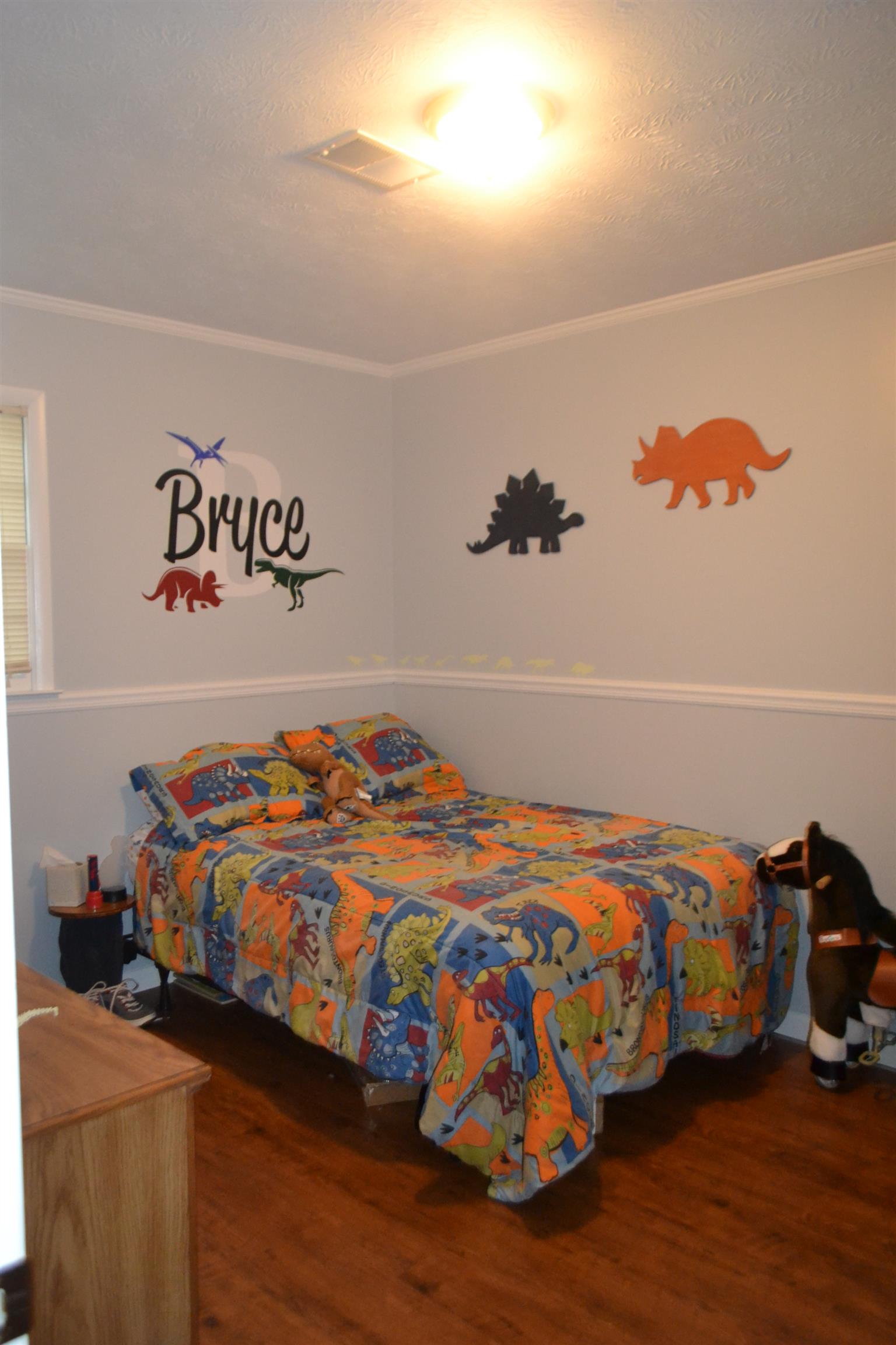 137 Rains Road Morrison, TN 37357 - Photo 16 of 24 a bedroom with a bed and a couch