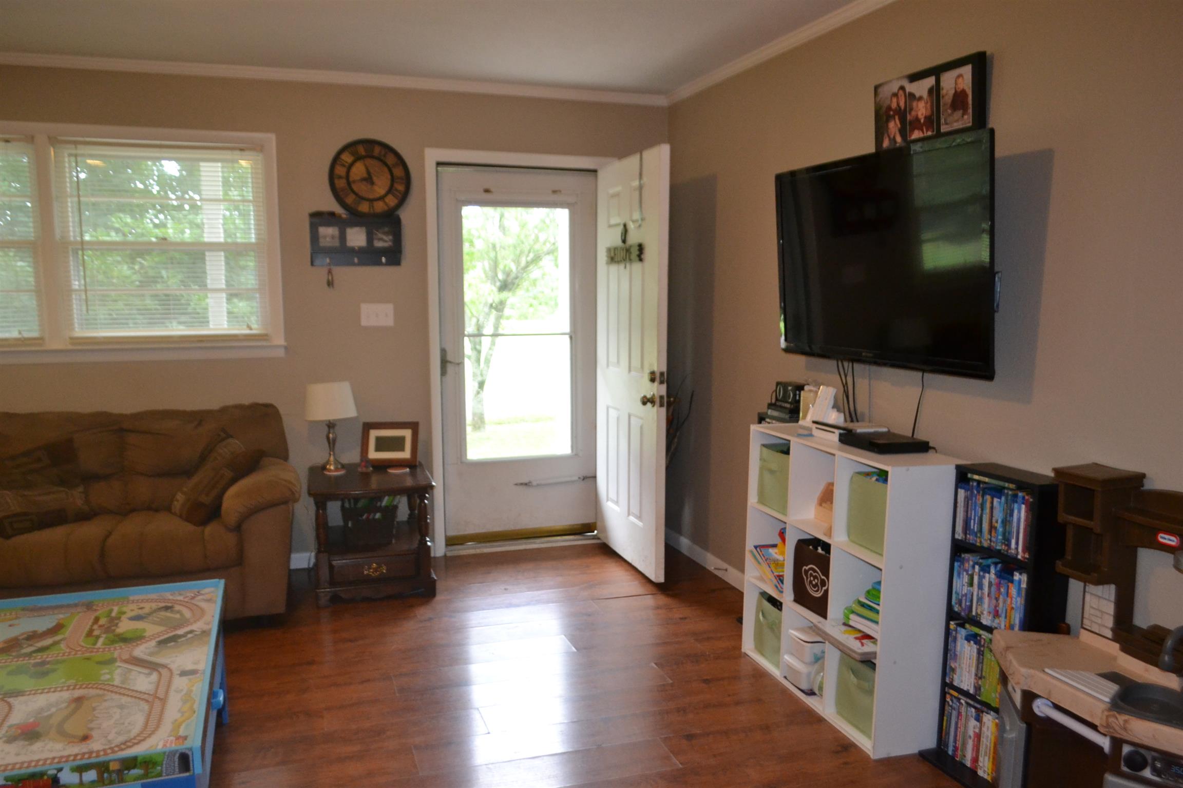 137 Rains Road Morrison, TN 37357 - Photo 8 of 24 a living room with furniture and a flat screen tv
