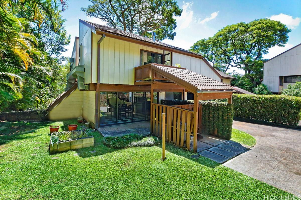 2821 A Manoa Road, Unit A1 Honolulu, HI 96822 - Photo 1 of 1 a view of a house with a yard and sitting area