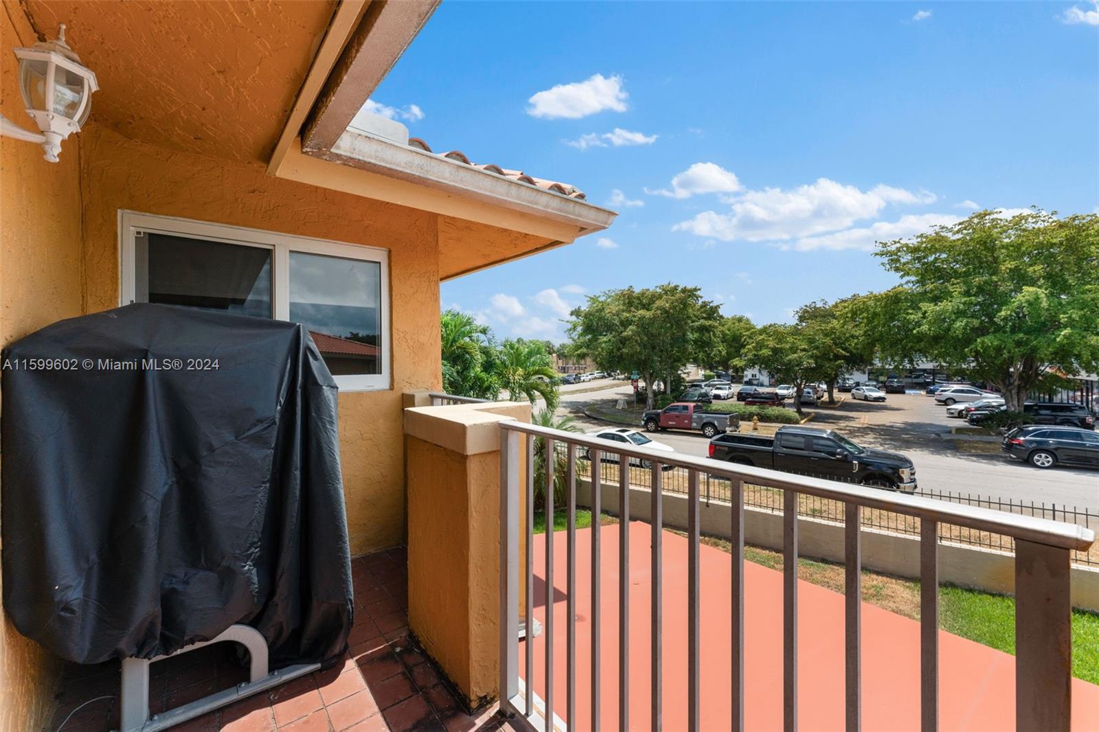 13926 Southwest 65th Terrace, Unit 3 Miami, FL 33183 - Photo 18 of 34 a view of a balcony with chairs