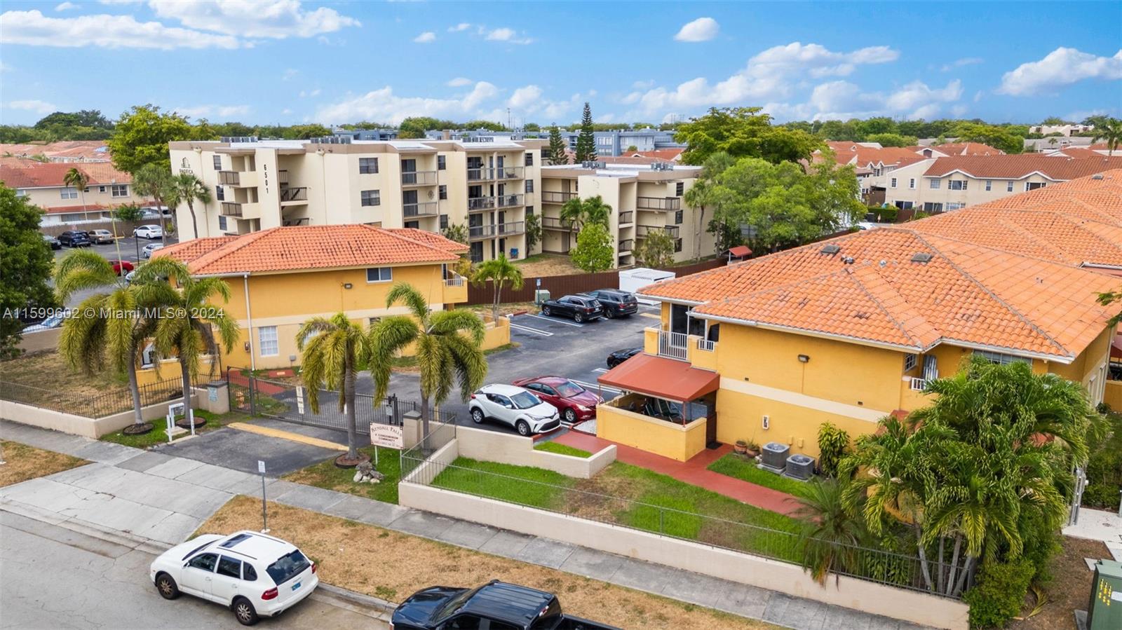 13926 Southwest 65th Terrace, Unit 3 Miami, FL 33183 - Photo 23 of 34 an aerial view of multiple houses with yard