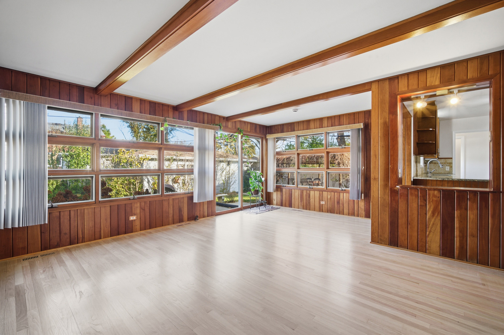 1700 Marguerite Street Park Ridge, IL 60068 - Photo 14 of 44 a view of an empty room with wooden floor and a window