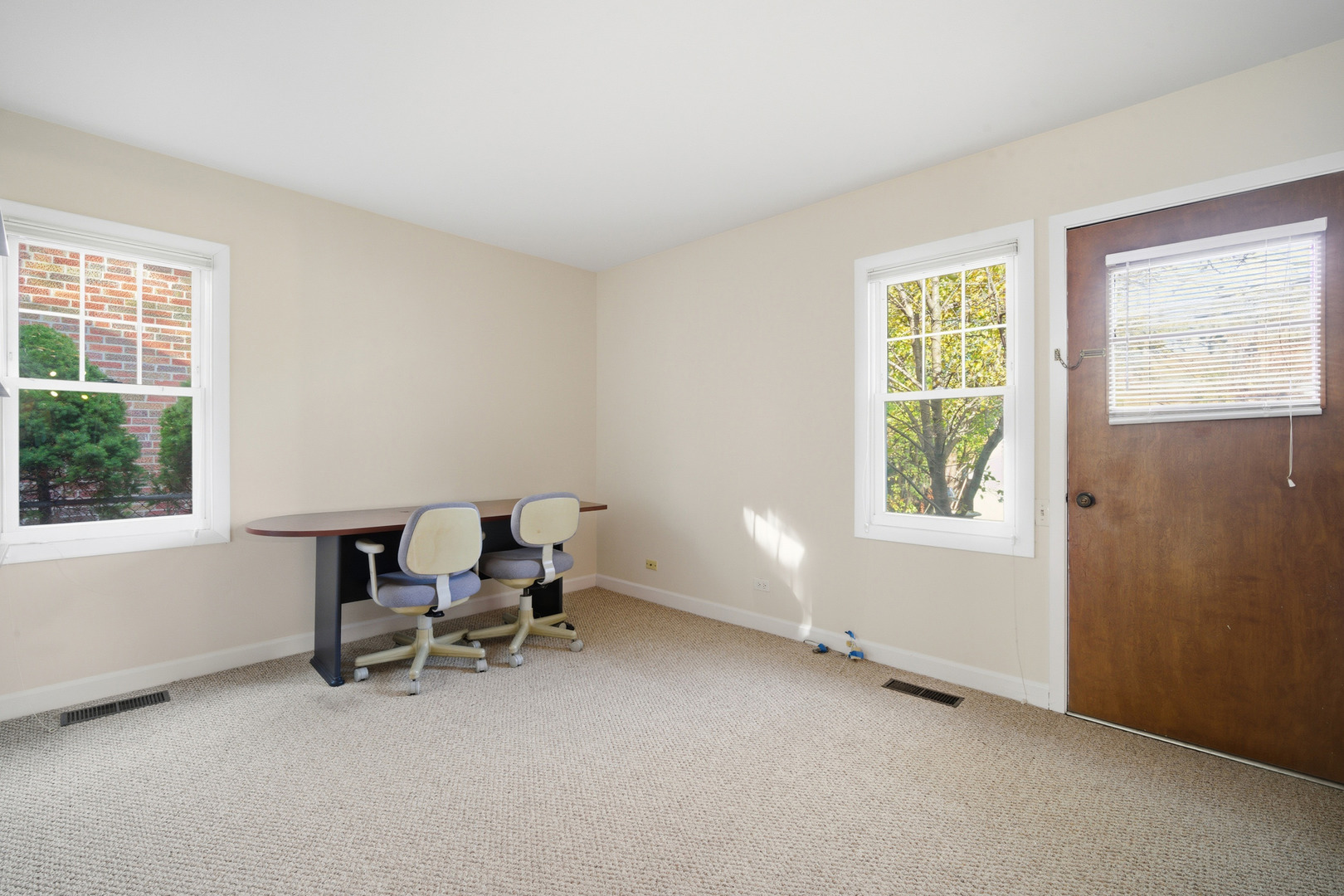 1700 Marguerite Street Park Ridge, IL 60068 - Photo 20 of 44 a view of a workspace with furniture and a window