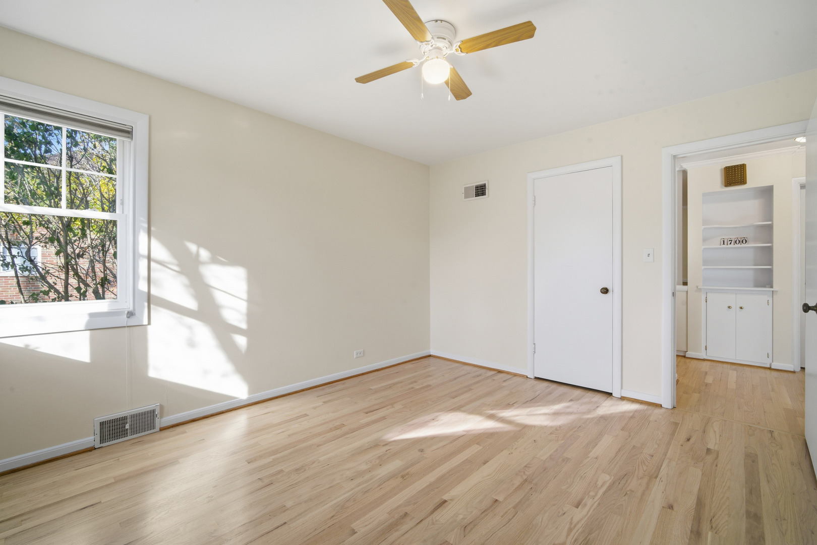 1700 Marguerite Street Park Ridge, IL 60068 - Photo 24 of 44 a view of empty room with wooden floor and fan
