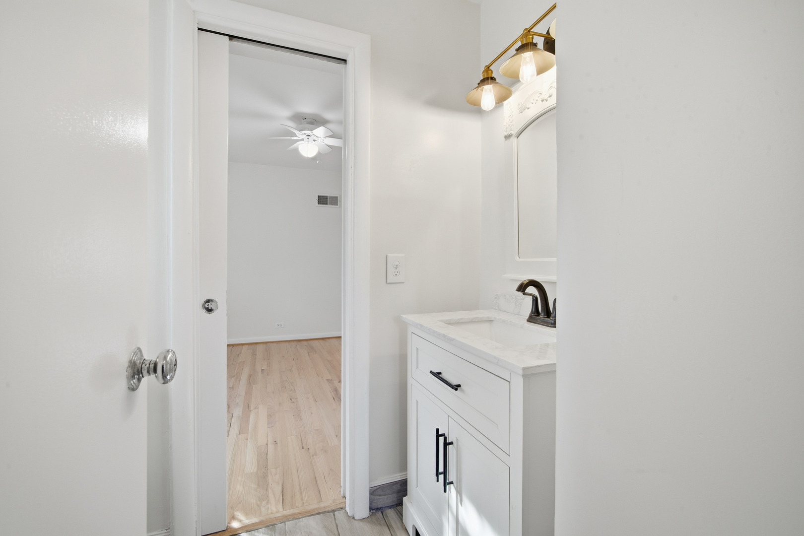 1700 Marguerite Street Park Ridge, IL 60068 - Photo 26 of 44 a bathroom with a sink and mirror with shower