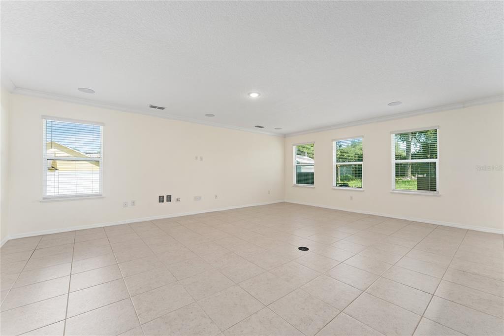4331 Wayne Road Fruitland Park, FL 34731 - Photo 19 of 46 a view of an empty room with a window