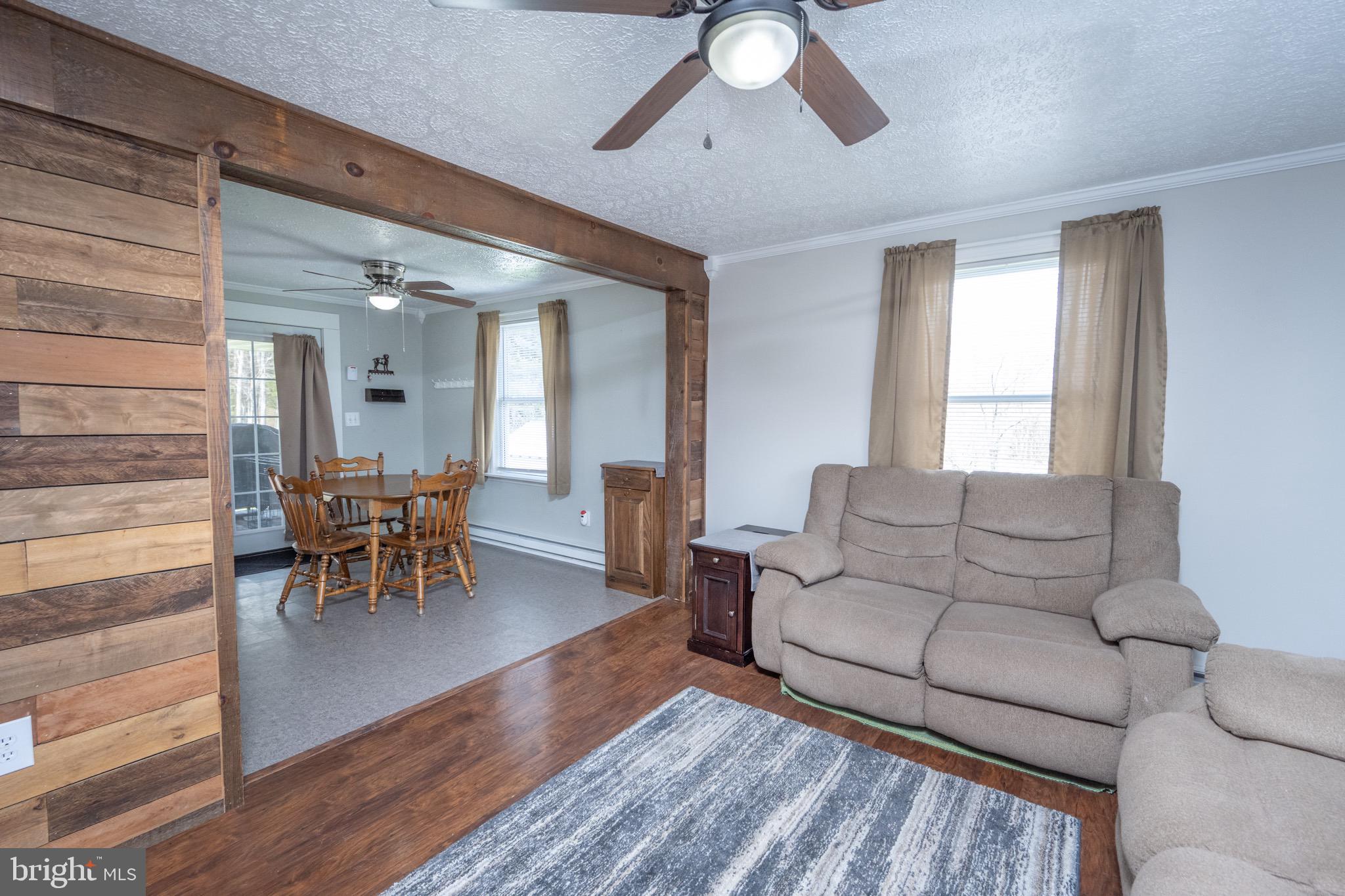 18 Ollie North Road Oakland, MD 21550 - Photo 11 of 48 a living room with furniture and a large window