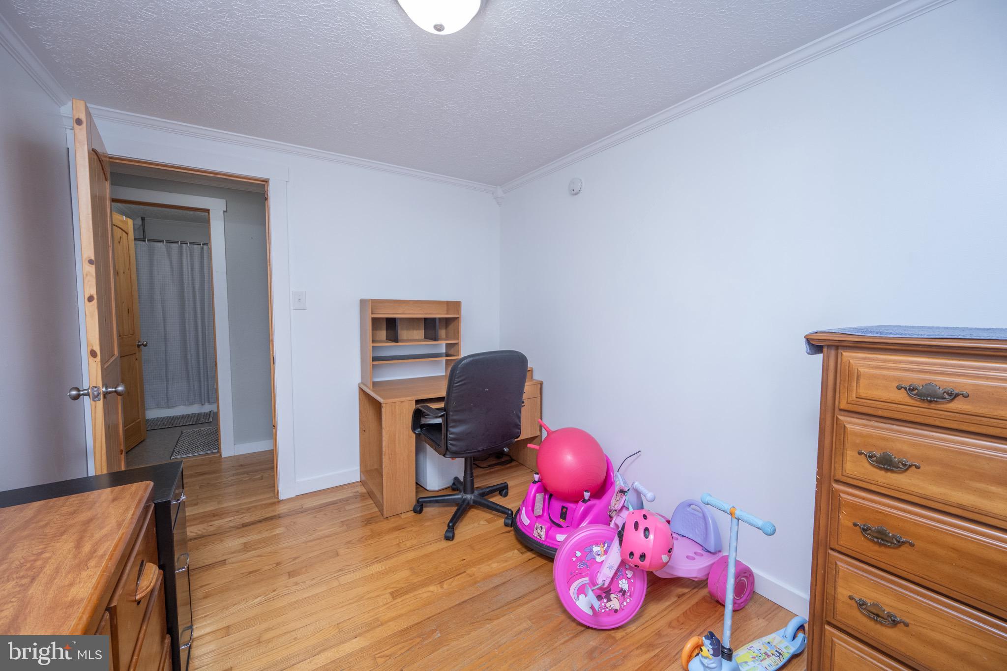 18 Ollie North Road Oakland, MD 21550 - Photo 19 of 48 a bedroom with furniture and wooden floor