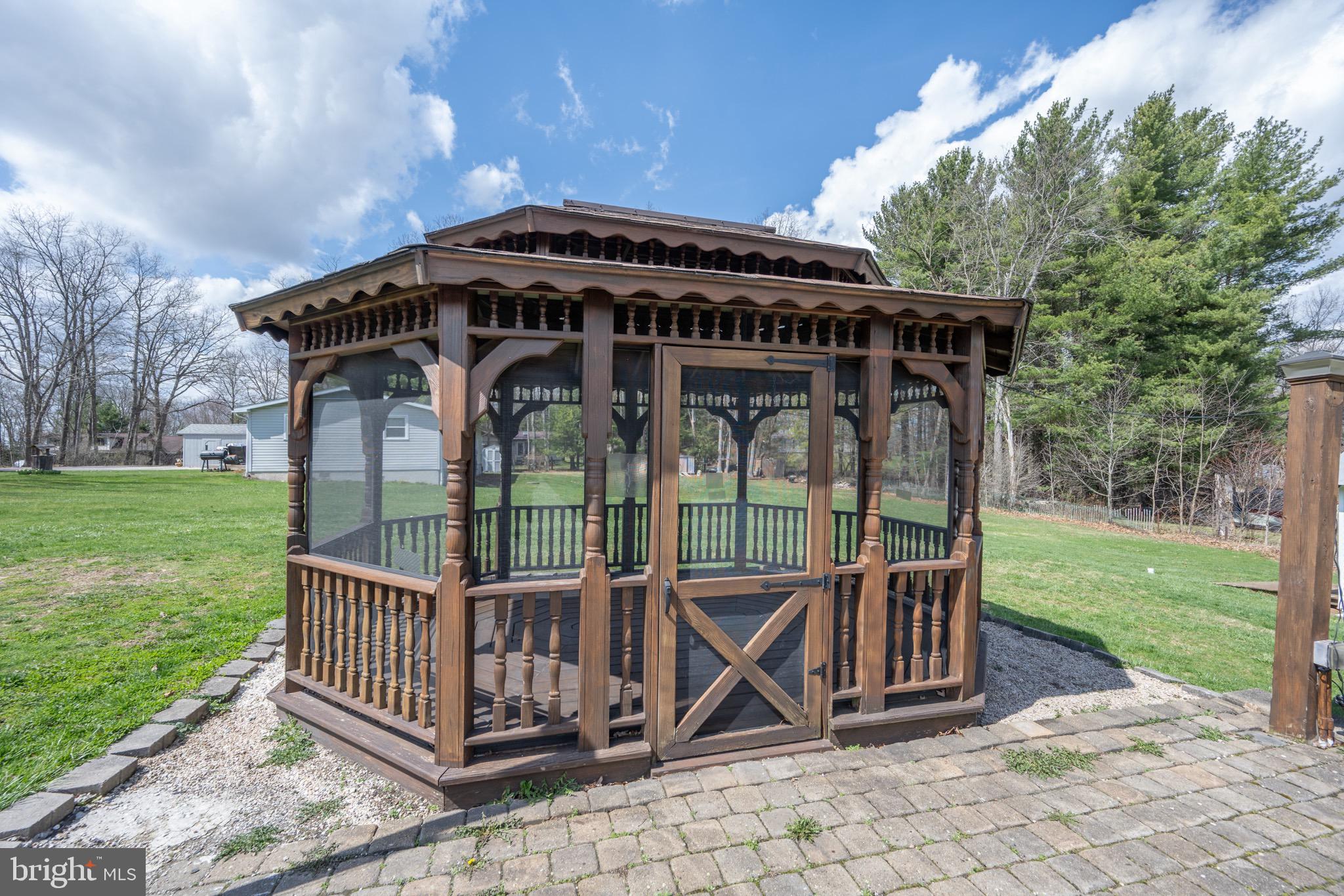18 Ollie North Road Oakland, MD 21550 - Photo 39 of 48 a view of a wooden deck with a backyard