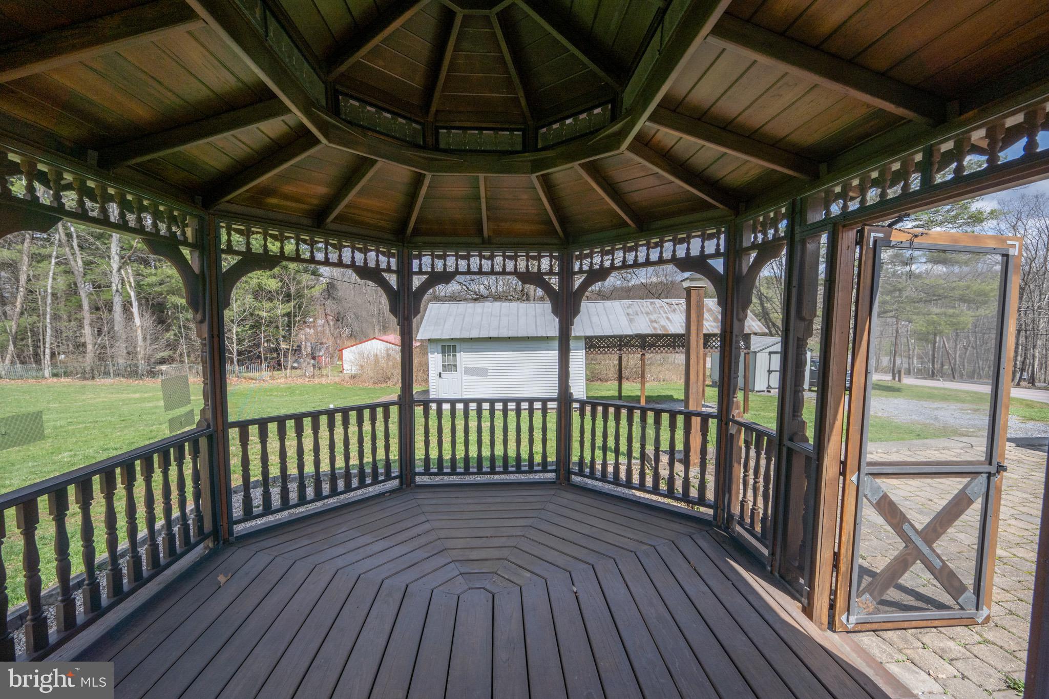 18 Ollie North Road Oakland, MD 21550 - Photo 40 of 48 a view of a porch with wooden floor
