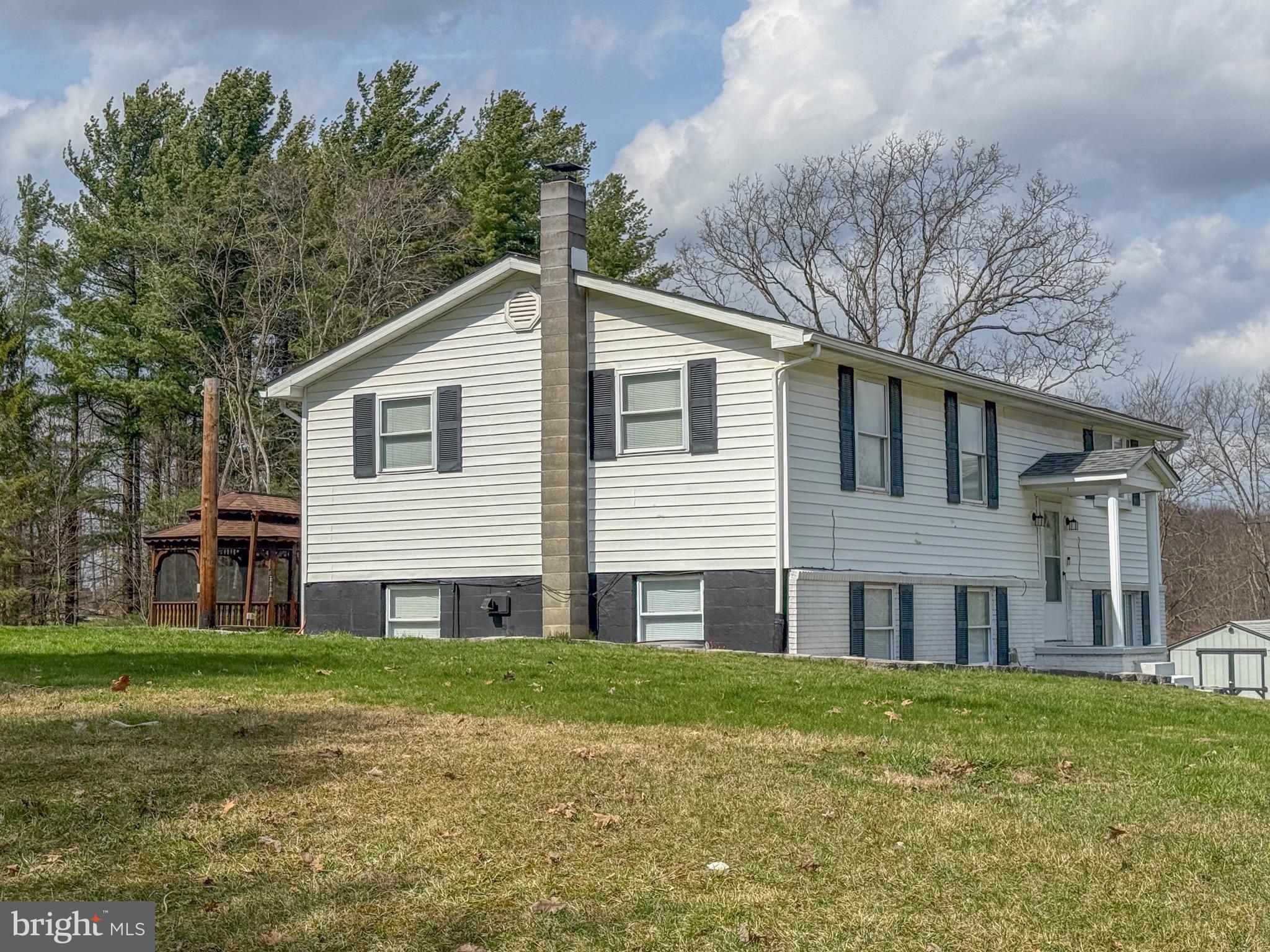 18 Ollie North Road Oakland, MD 21550 - Photo 42 of 48 a view of a house with a yard