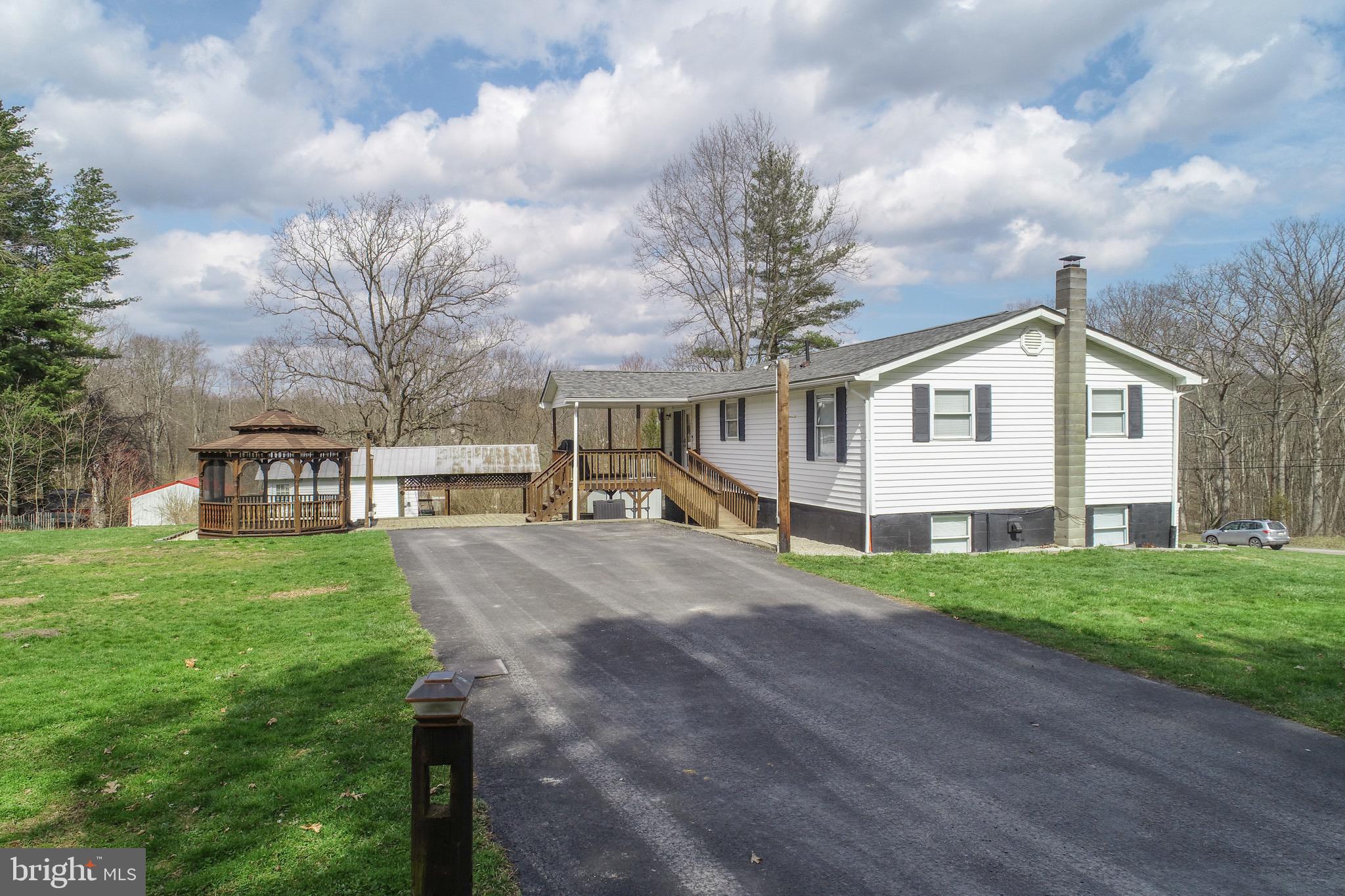 18 Ollie North Road Oakland, MD 21550 - Photo 45 of 48 a view of a house with a yard