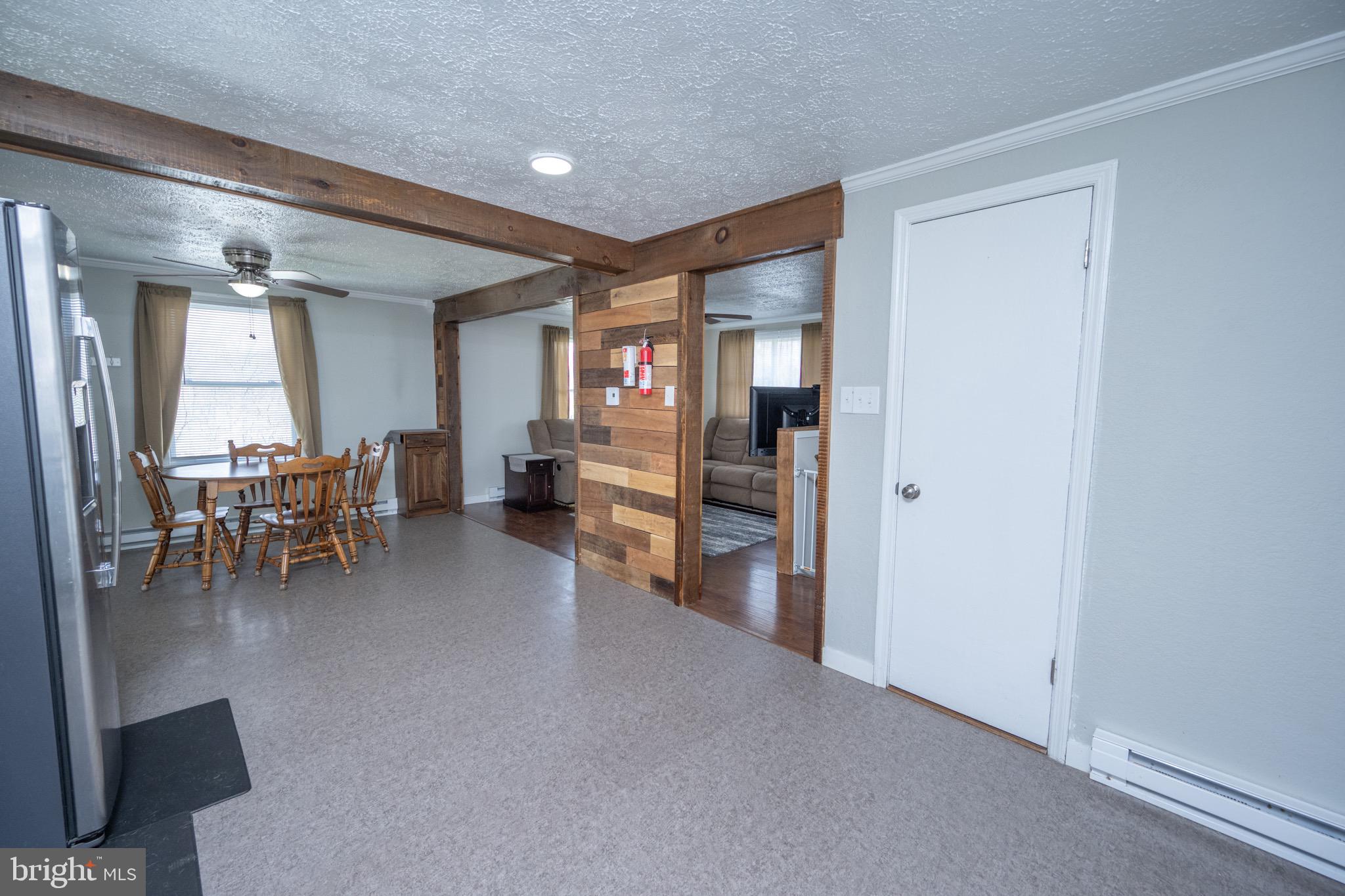 18 Ollie North Road Oakland, MD 21550 - Photo 7 of 48 a view of a livingroom with dining room and furniture