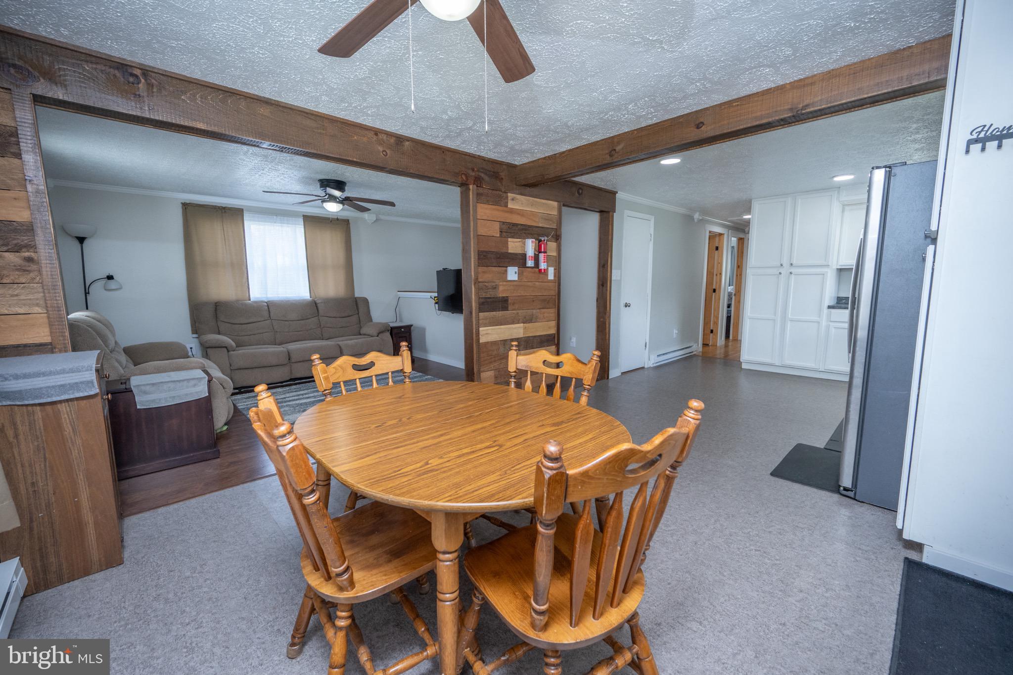 18 Ollie North Road Oakland, MD 21550 - Photo 8 of 48 a dining room with furniture and window