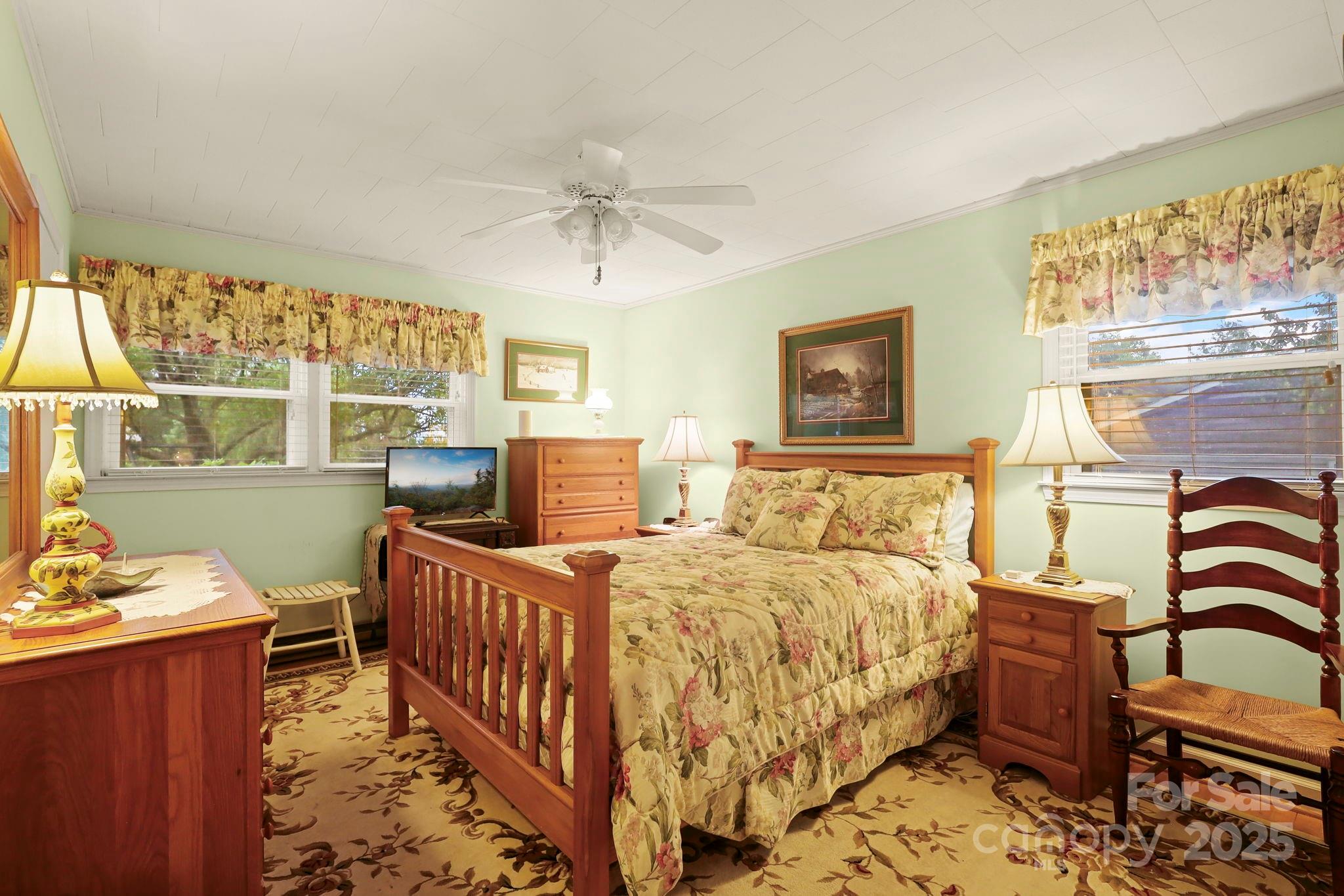 1074 Nikanor Road West Jefferson, NC 28694 - Photo 20 of 45 a bedroom with 2 bed and a window