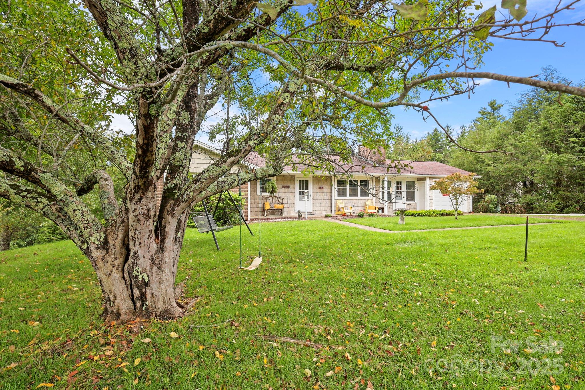 1074 Nikanor Road West Jefferson, NC 28694 - Photo 3 of 45 a view of house with backyard