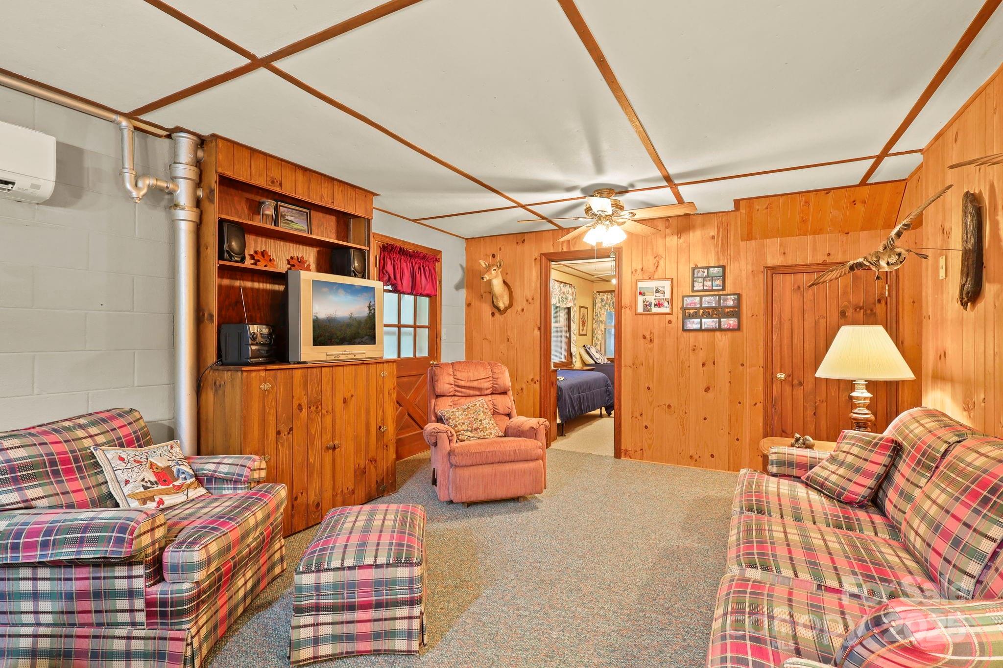 1074 Nikanor Road West Jefferson, NC 28694 - Photo 39 of 45 a bedroom with furniture and a window