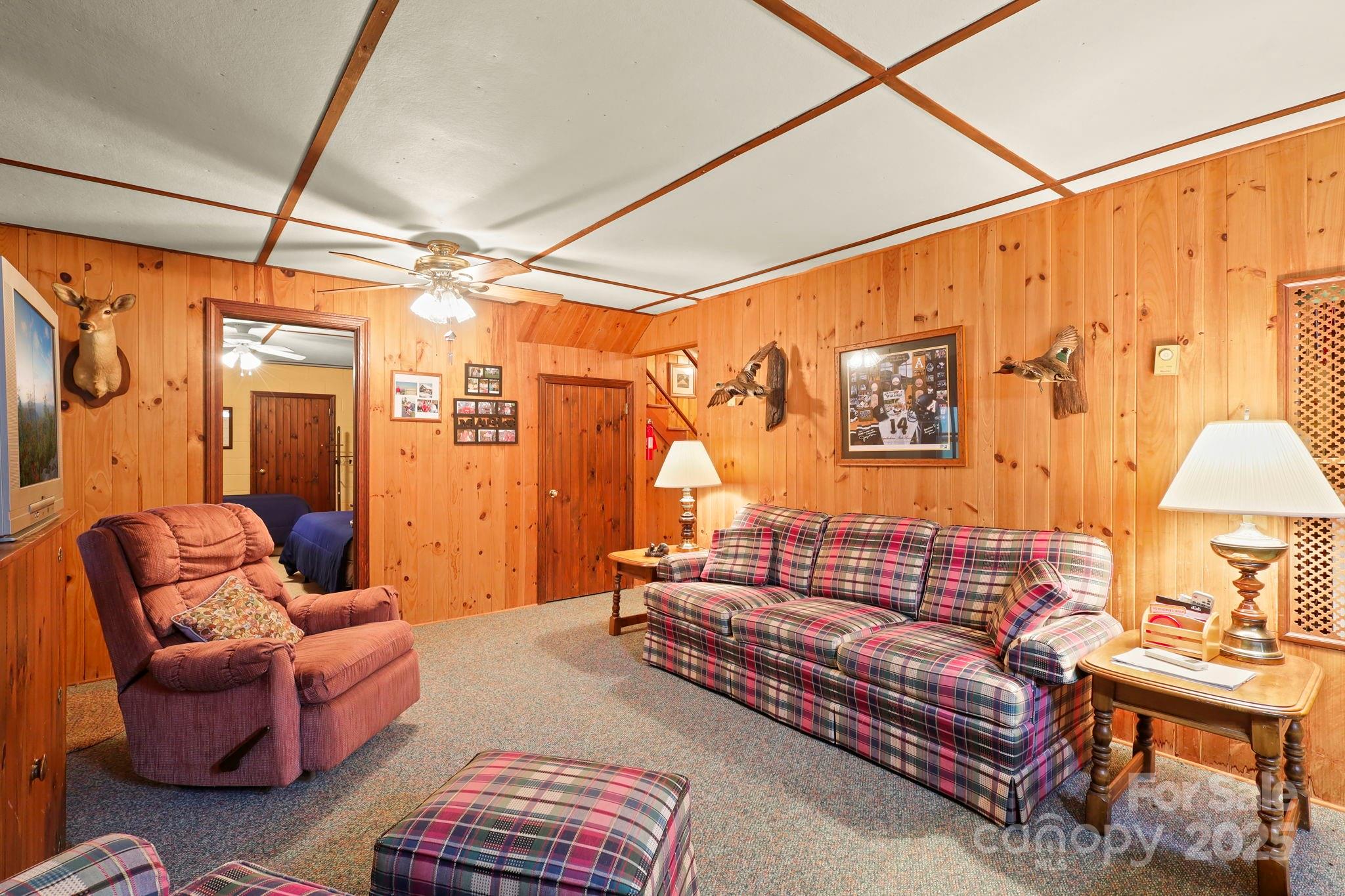 1074 Nikanor Road West Jefferson, NC 28694 - Photo 40 of 45 a outdoor living space with furniture and a rug