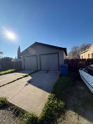 a house view with a backyard space