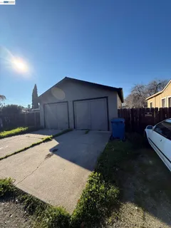 a house view with a backyard space