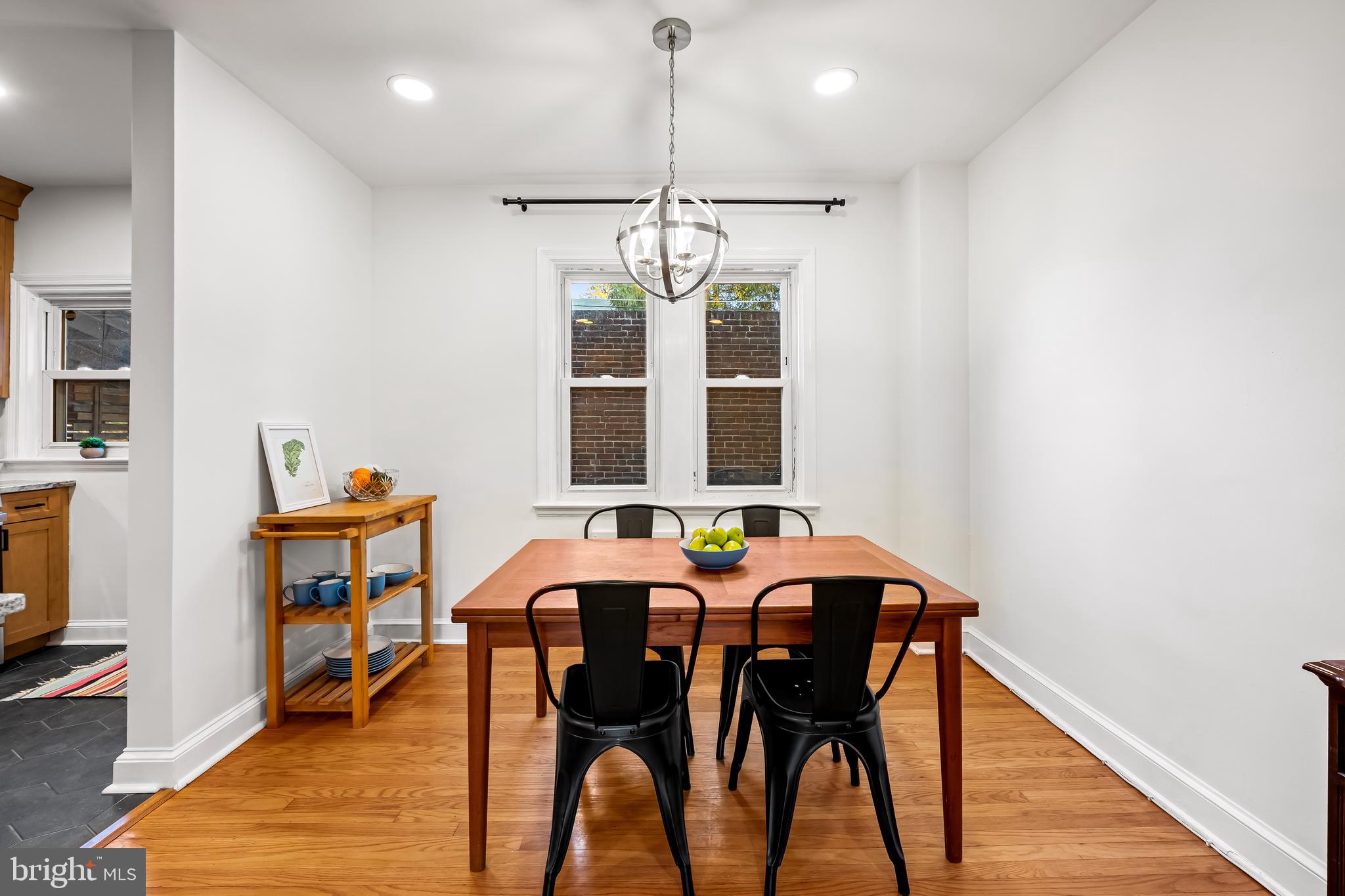 63 Burkshire Road Towson, MD 21286 - Photo 16 of 43 a view of a dining room with furniture window and wooden floor