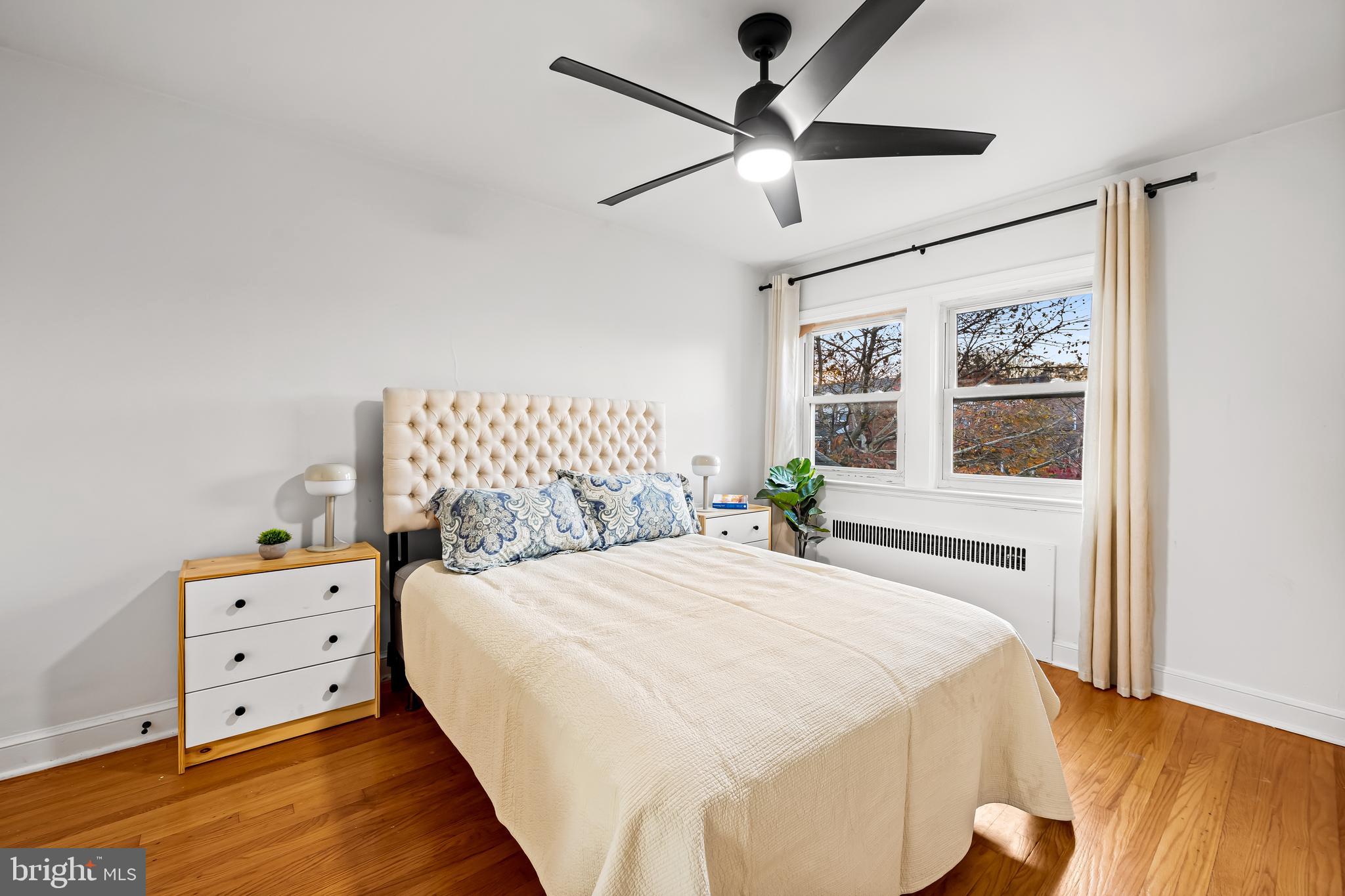 63 Burkshire Road Towson, MD 21286 - Photo 19 of 43 a bedroom with a large bed and a window