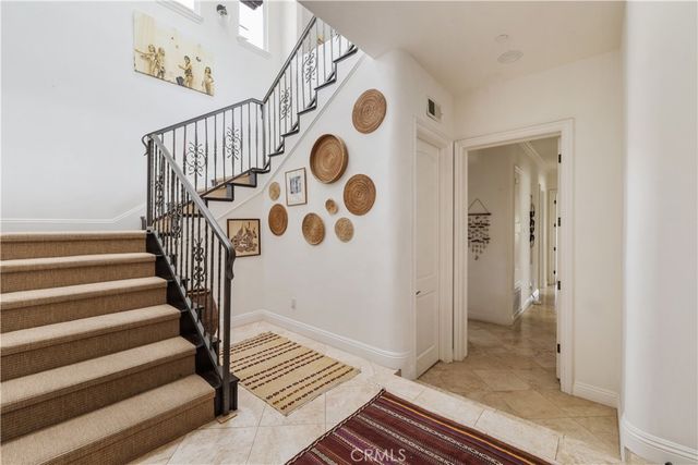 a bedroom with bed and a window