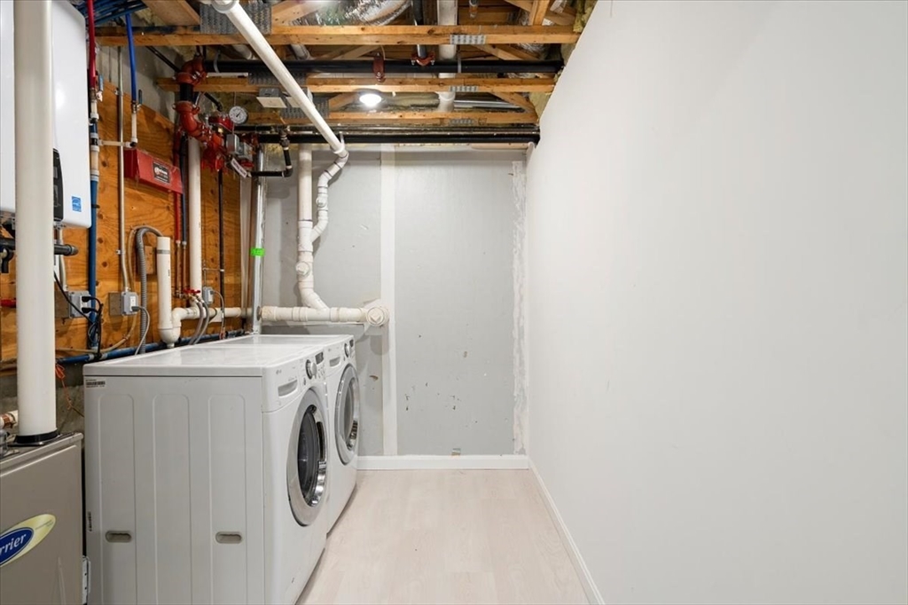 6 Bates Street, Unit A Devens, MA 01434 - Photo 28 of 41 a utility room with dryer and washer