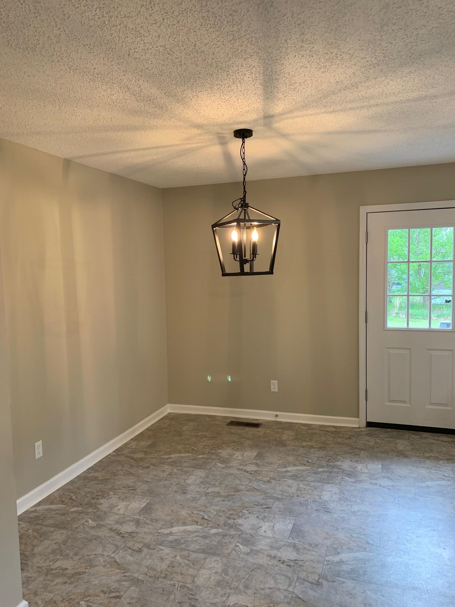 80 Halliburton Street Gates, TN 38037 - Photo 12 of 14 a view of room with a ceiling fan and window