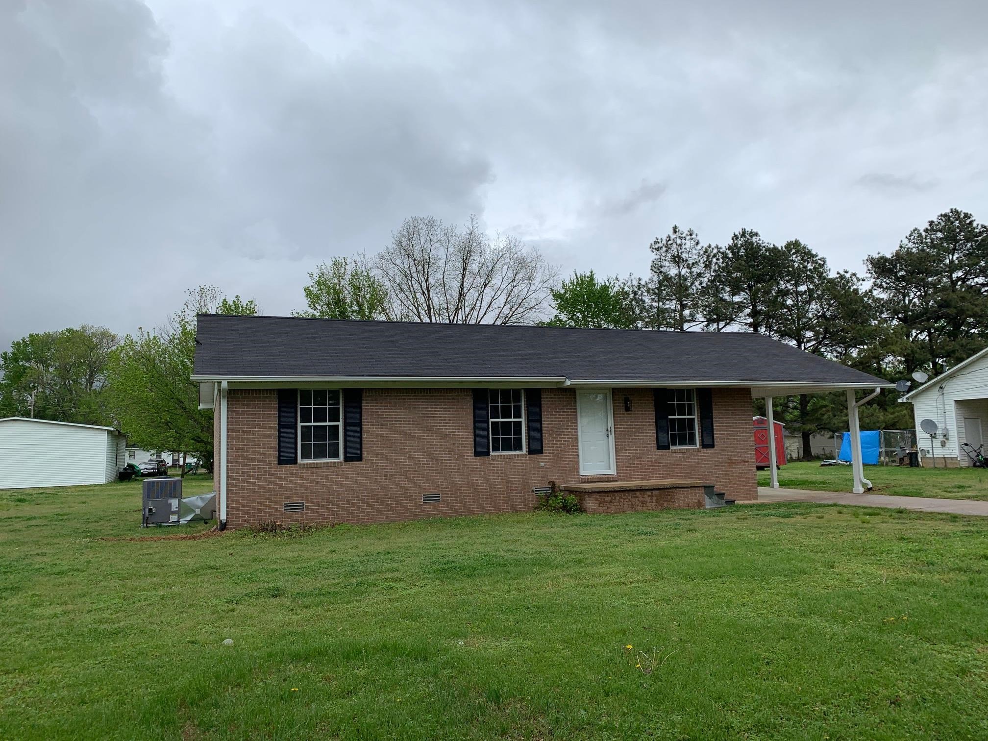 80 Halliburton Street Gates, TN 38037 - Photo 2 of 14 a front view of house with yard and green space