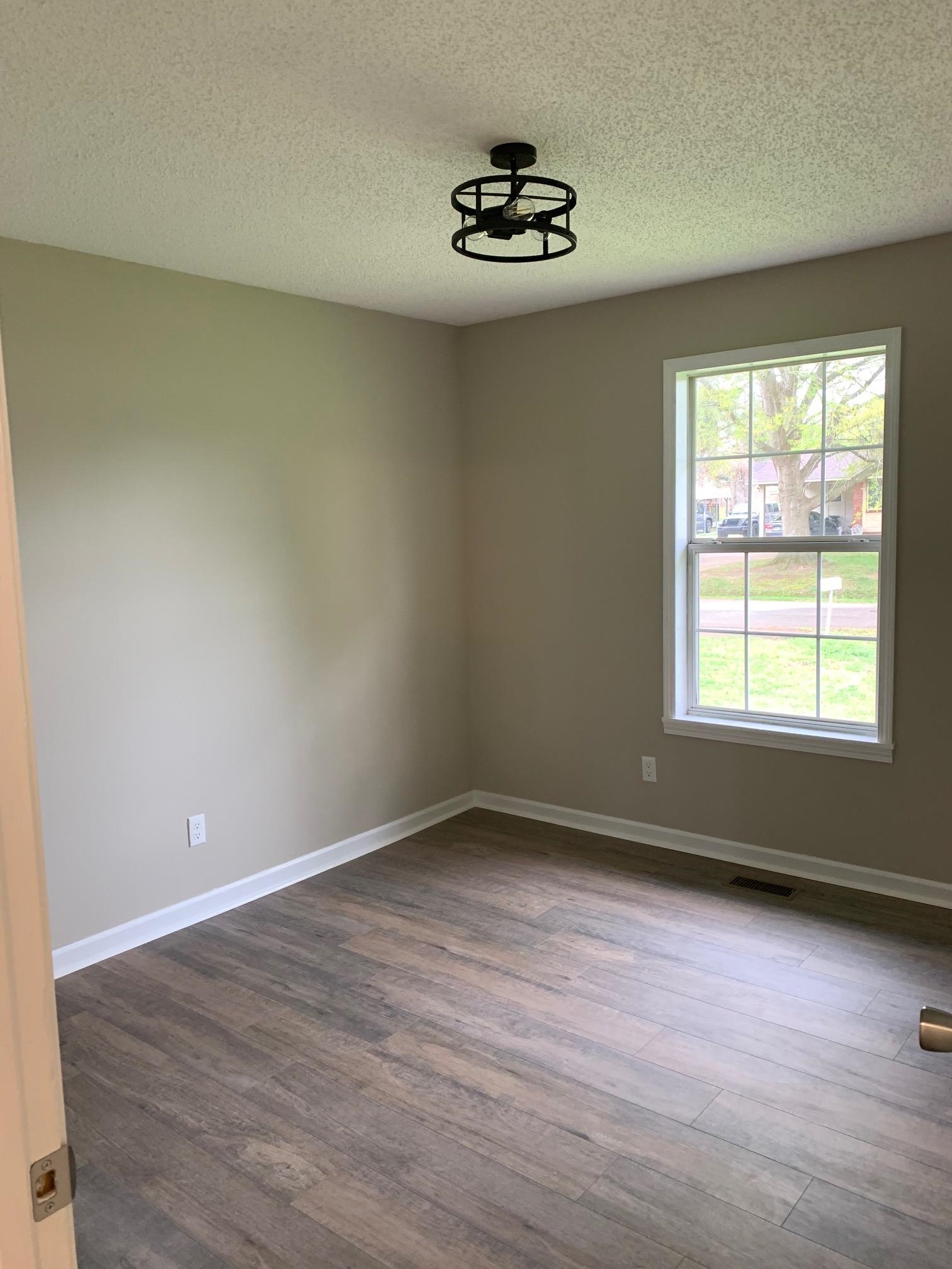 80 Halliburton Street Gates, TN 38037 - Photo 8 of 14 a view of an empty room with a window